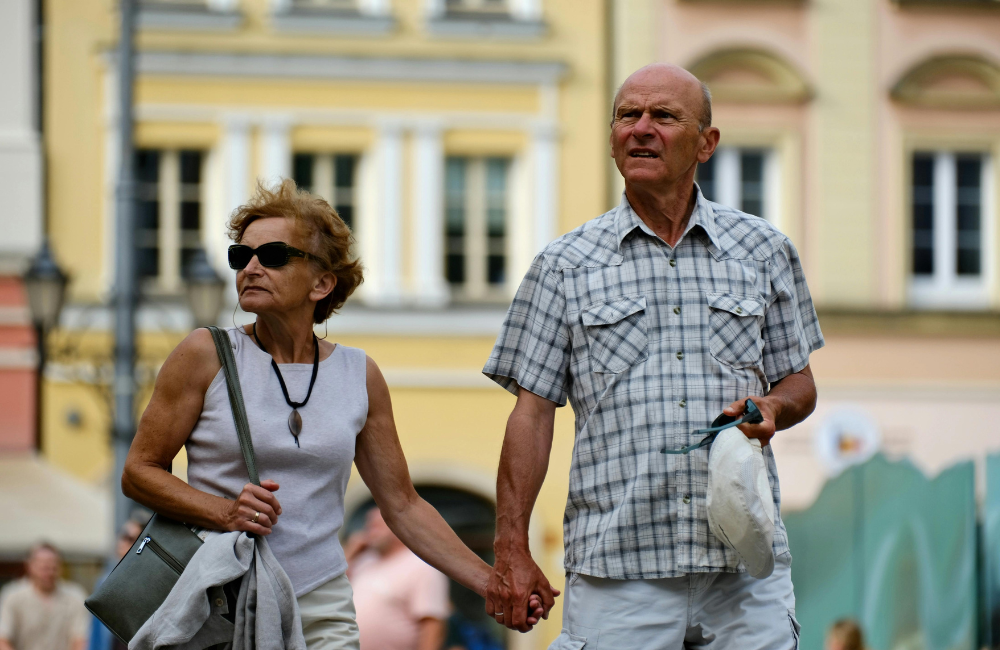Can British expats over 70 get travel insurance for visiting home